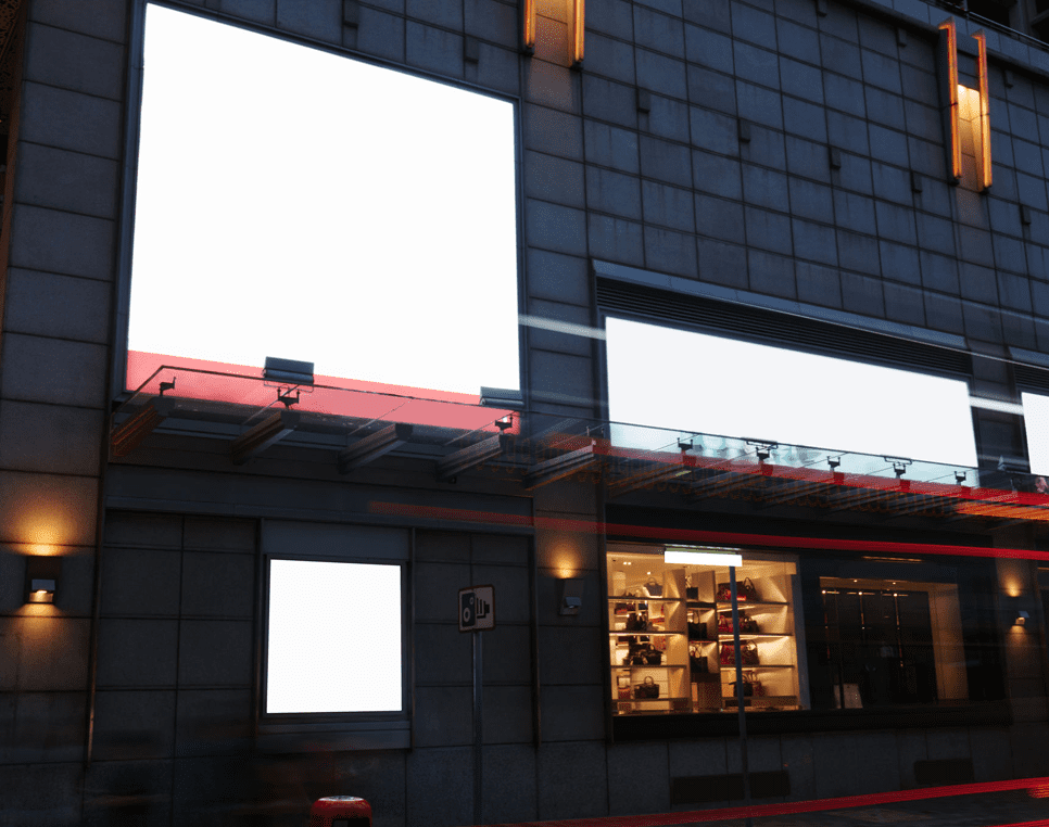 Building facade with large blank billboards.